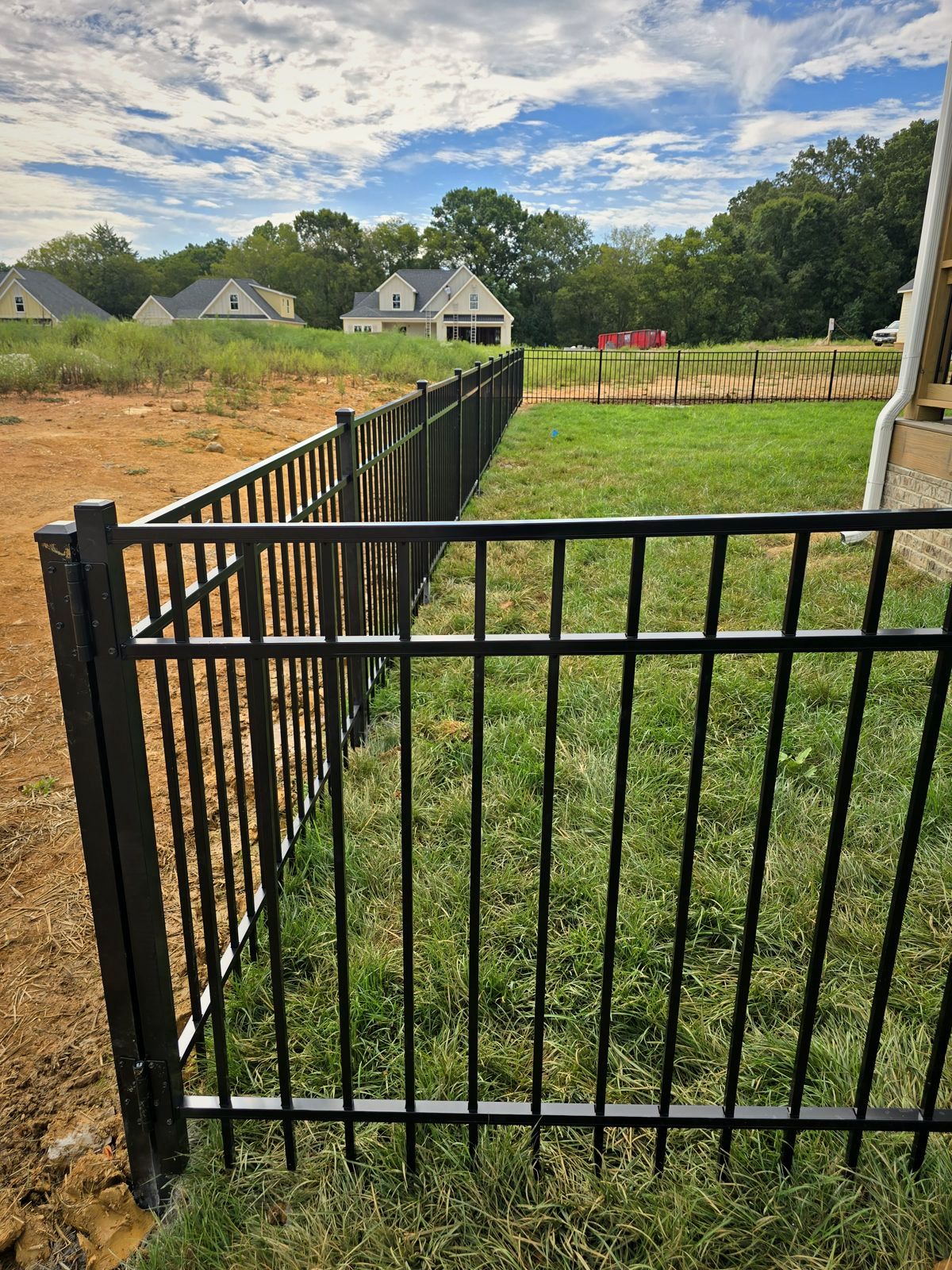Black aluminum gate at a new home