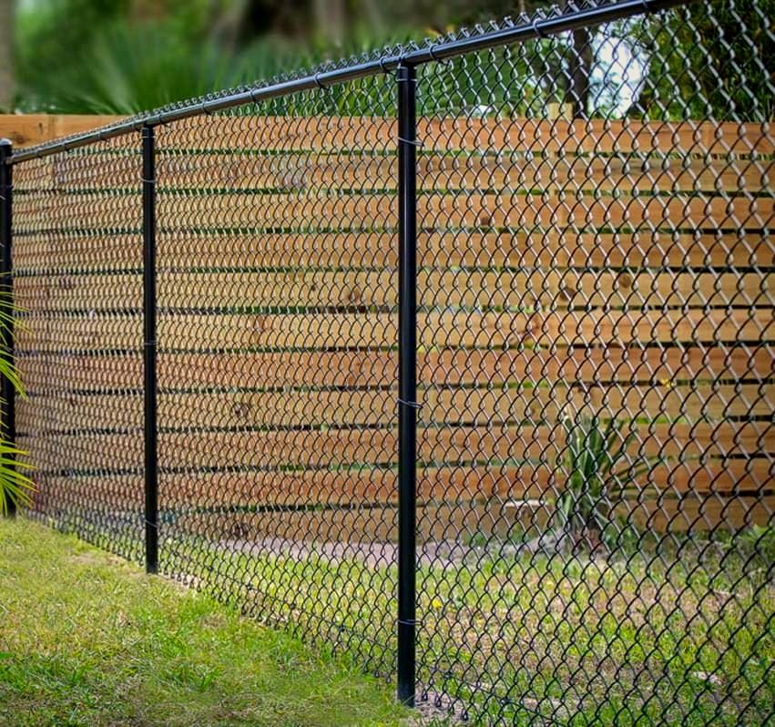 Black vinyl-coated chain link fence with top rail