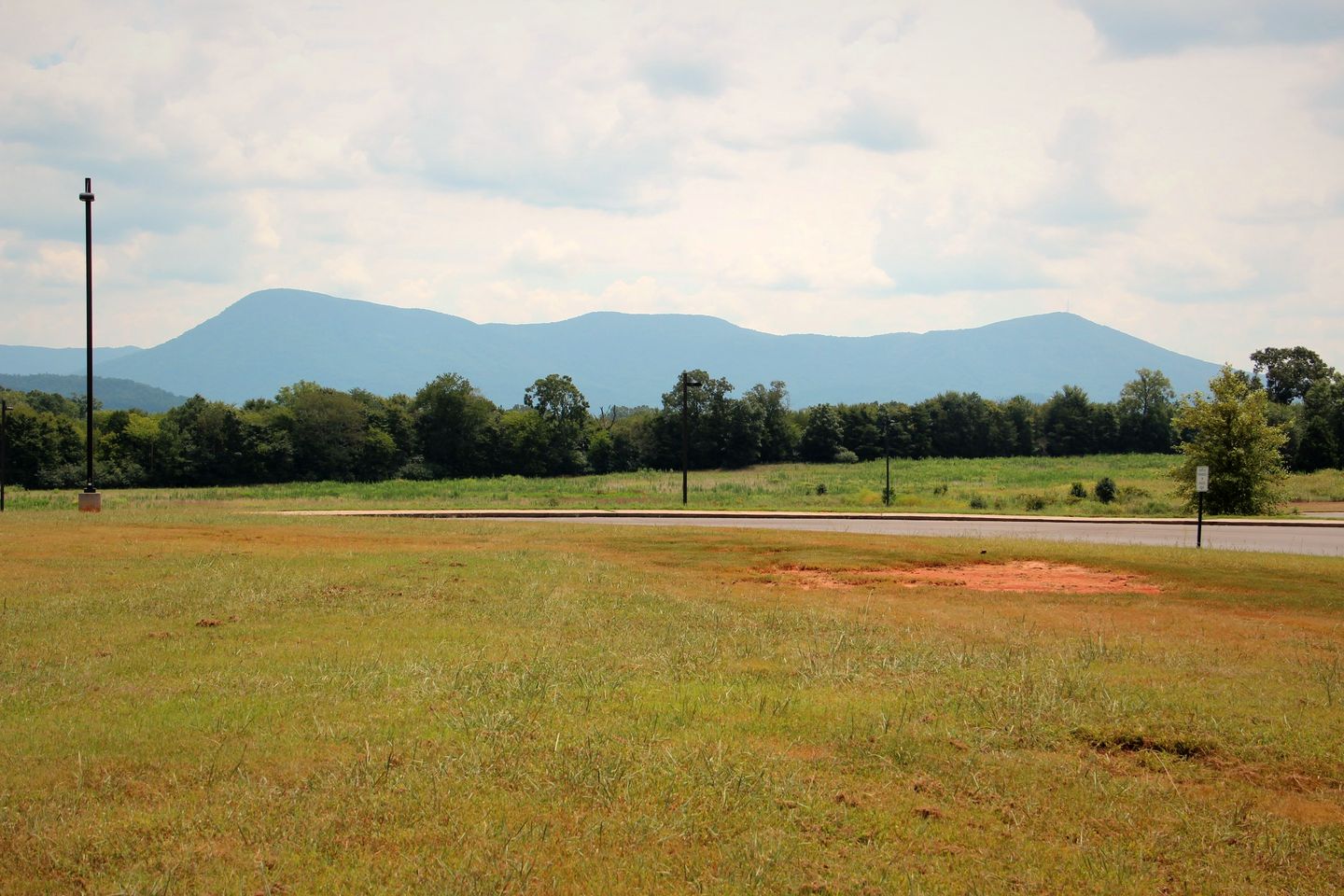 The Cohutta Mountains rising beyond an open field just outside Chatsworth, Georgia