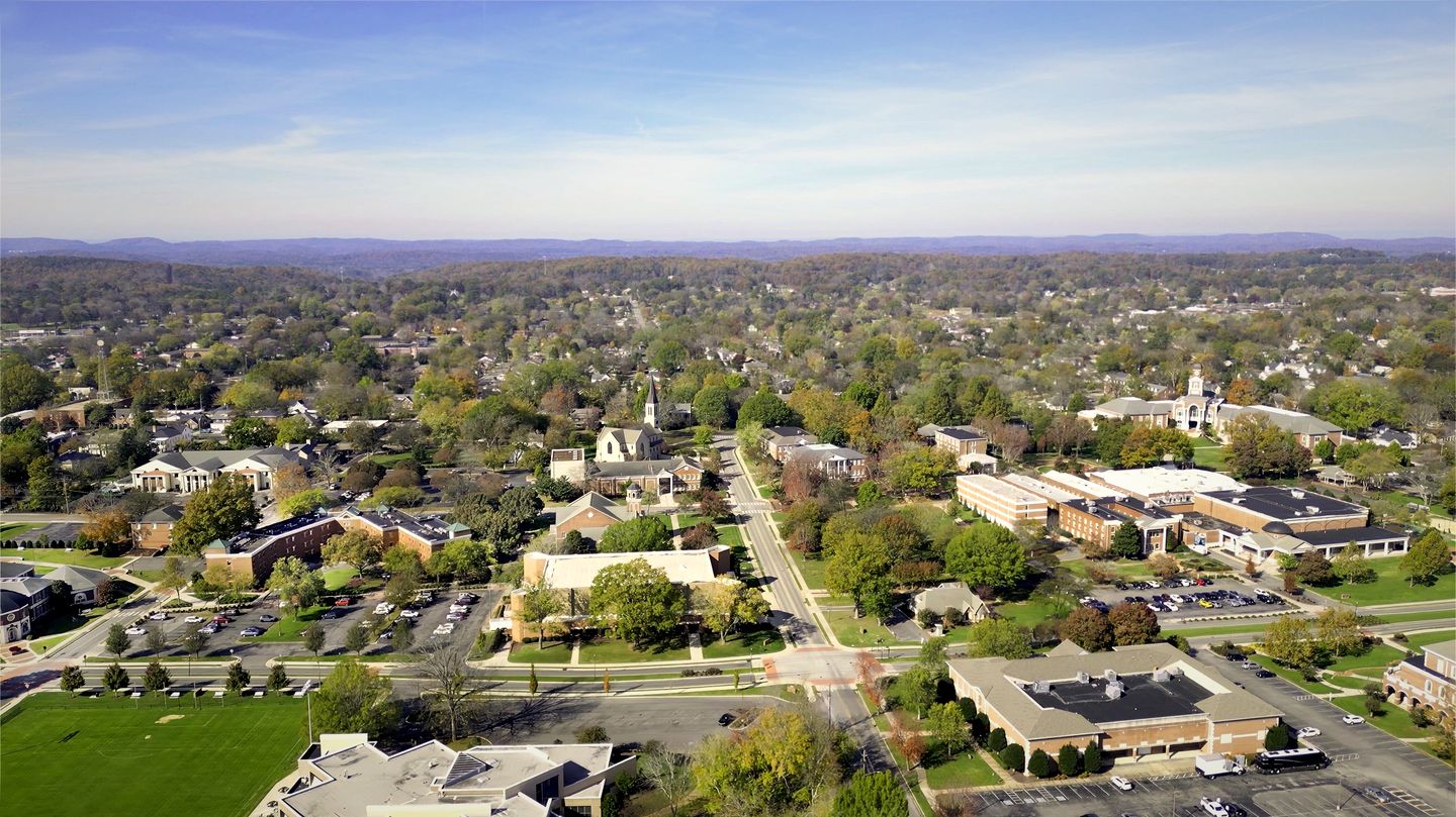 Aerial view over the Lee University campus and the tree-lined streets of Cleveland, Tennessee
