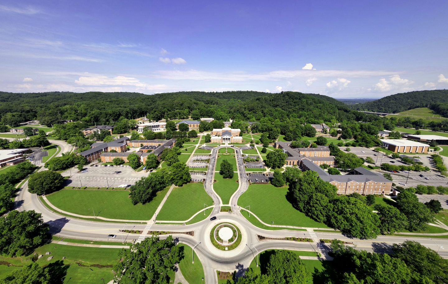 Aerial view of the Southern Adventist University campus and wooded ridges in Collegedale, Tennessee