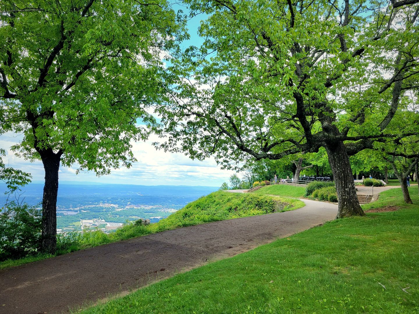 A shaded walking path at Point Park on Lookout Mountain overlooking the valley below