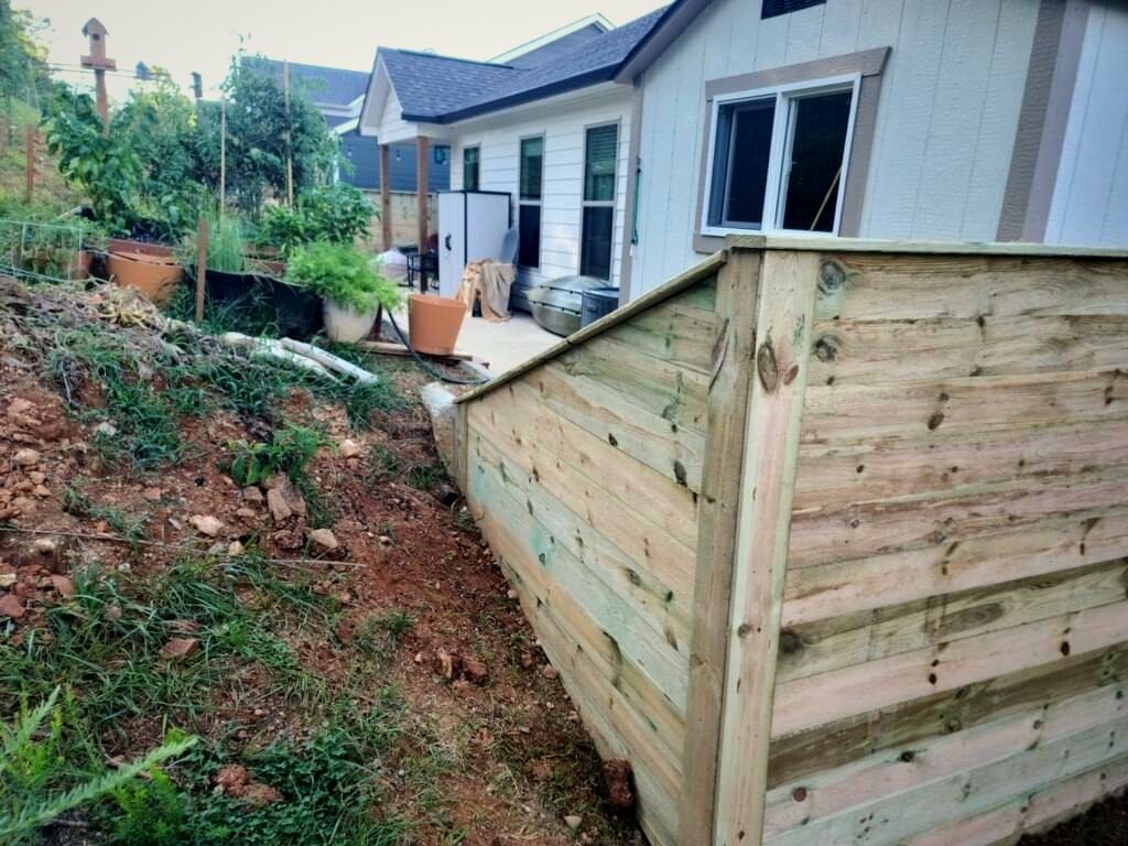 Horizontal wood fence along a garden
