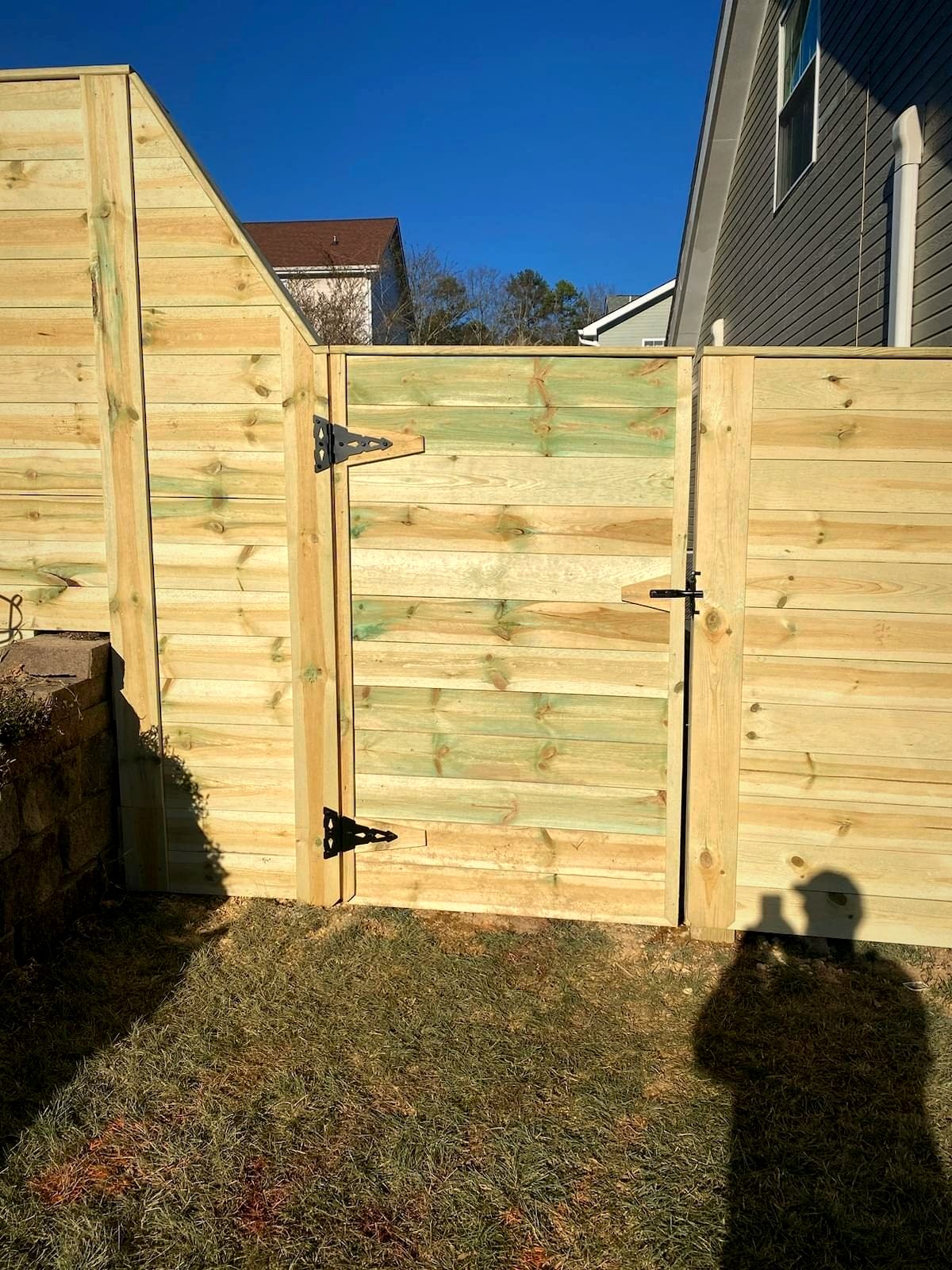 Horizontal-board wood fence and gate
